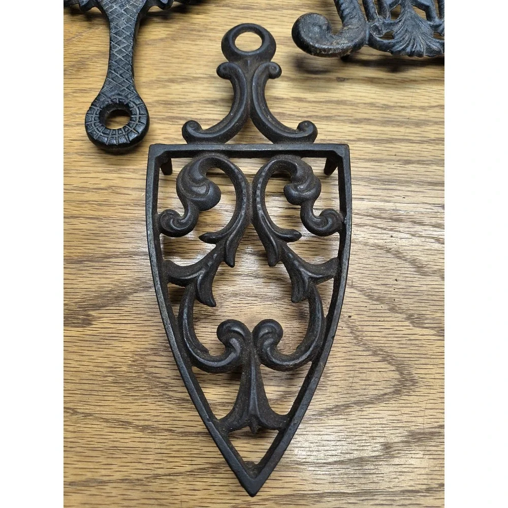 Vintage Black Cast Iron Trivets (set of 3)‎